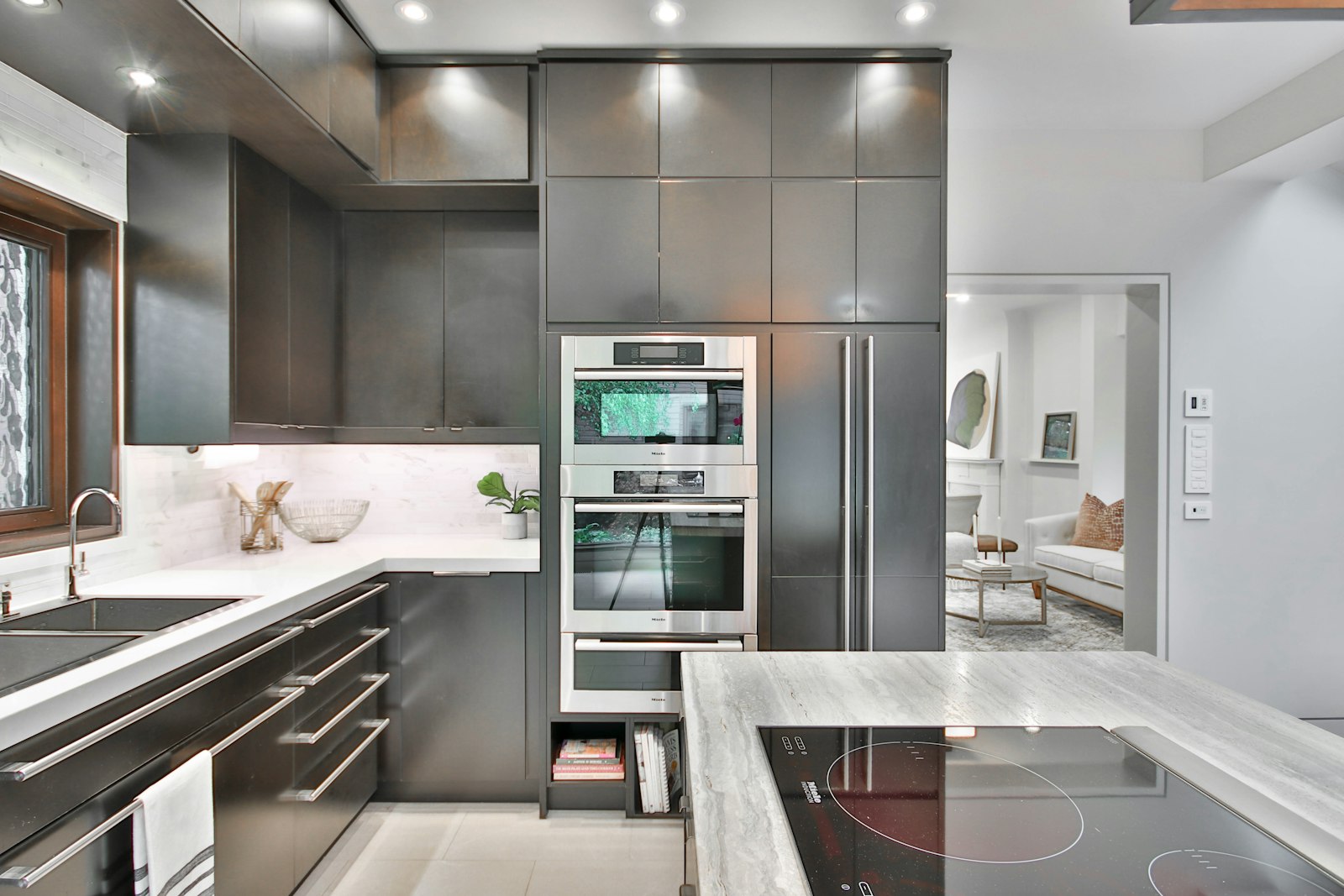 Deep-cleaned modern kitchen with marble countertop and stainless steel appliances in Dubai